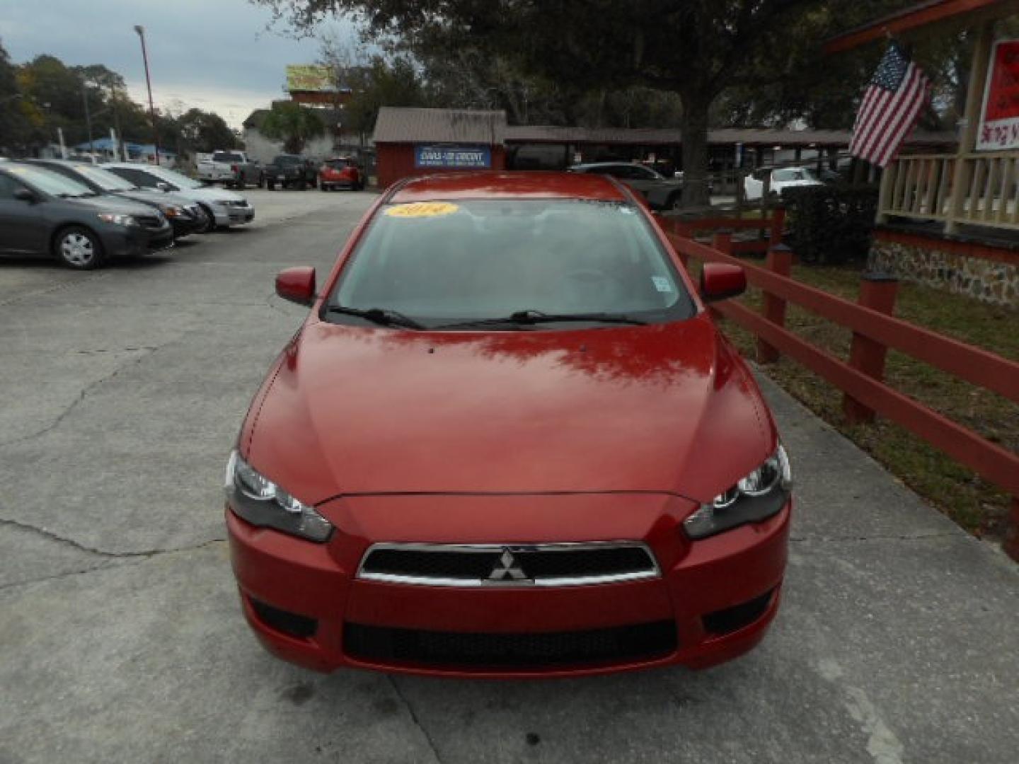 2014 RED MITSUBISHI LANCER (JA32U2FU2EU) , located at 390 Hansen Avenue, Orange Park, FL, 32065, (904) 276-7933, 30.130497, -81.787529 - Photo#0